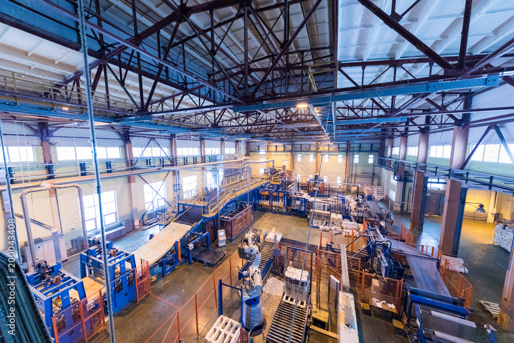 Obraz premium Fiberglass production industry equipment at manufacture background