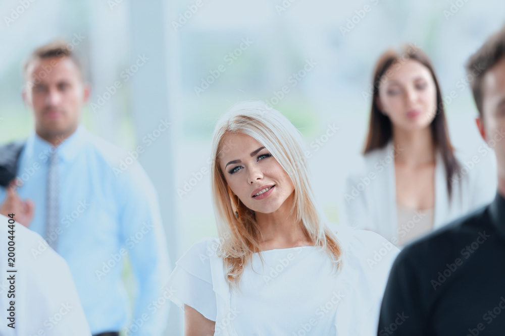 closeup of confident business woman on blurred background office closeup of confident business woman on blurred background office