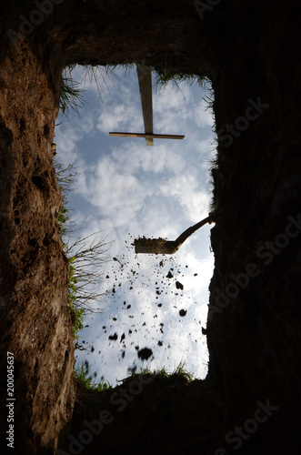 Canvas Print View upwards from the botom of a grave, a last glimpse of the sky