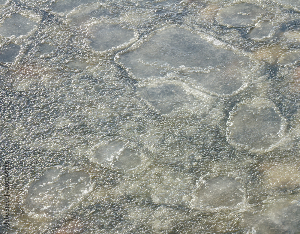 Surface of snow sludge on water. Surface of snow sludge on water.