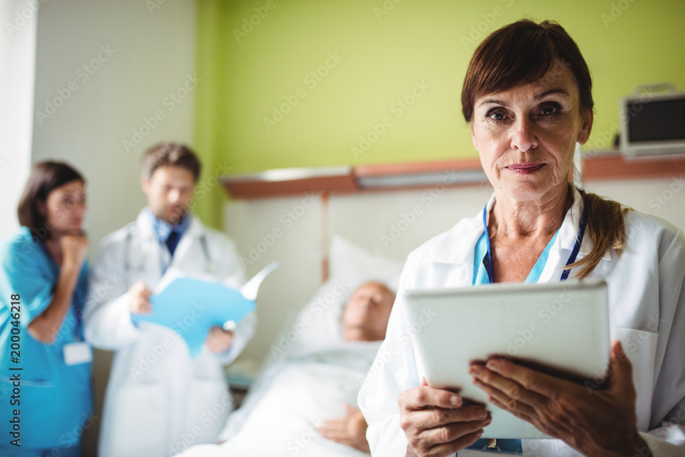 Female doctor using digital tablet Female doctor using digital tablet
