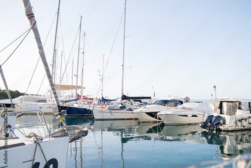 Fototapeta premium Picture of luxury white yachts in harbor