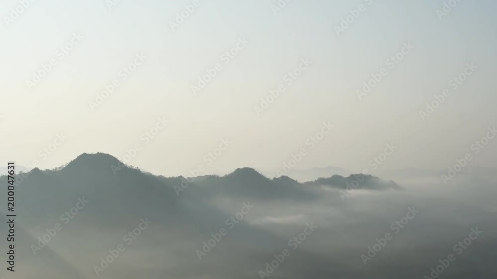 Time lapse, Landscape of Morning Mist with Mountain Layer at Doi Phangam, north of Thailand. Time lapse, Landscape of Morning Mist with Mountain Layer at Doi Phangam, north of Thailand.