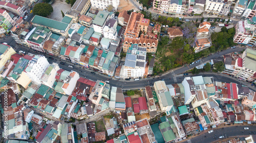 Aerial view from the drone to Dalat city roofs and roads.Located on the Langbian Plateau in the southern parts of the Central Highlands region of Vietnam
