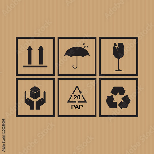 Packaging symbols set on cardboard background