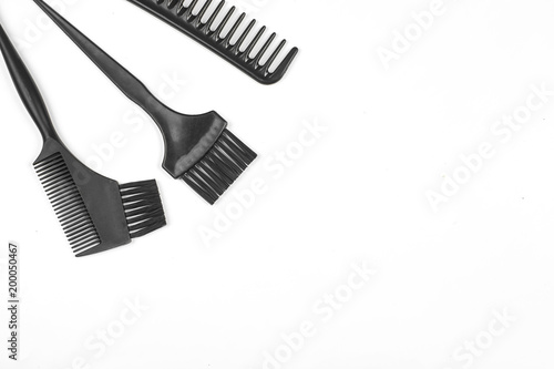 Professional hairdresser tools on white background with copy space