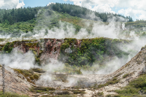 scenic shot of Geothermal hot springs on sunny day, Craters of the Moon, New Zealand