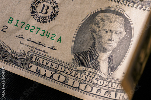 The front of a two dollar bill,