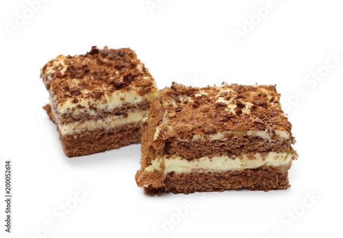 Chocolate and vanilla cake, pastry slice isolated on white background