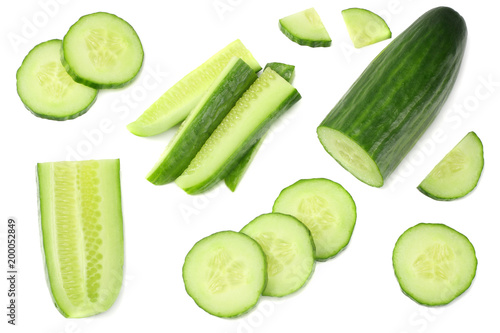 Vászonkép fresh cucumber slices isolated on white background. top view
