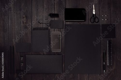 Slika na platnu Luxury corporate identity template with black blank paper stationery set, phone on dark elegans wood board