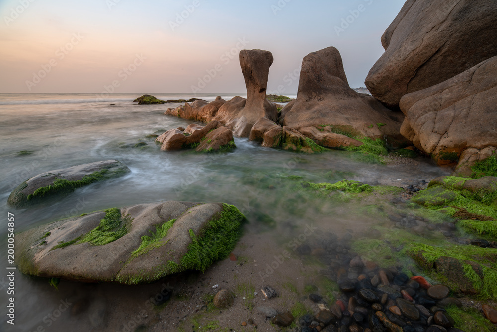 Seascape of Vietnam Strange rocks and moss at Co Thach beach, Tuy Phong, Binh Thuan province, Vietnam