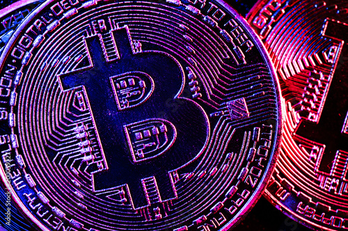 Bitcoin coins in a mysterious lighting