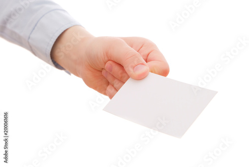 Child's hand showing an empty business card