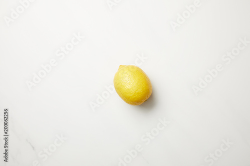 Ripe yellow lemon citrus fruit isolated on white
