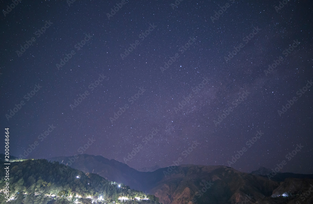 starry sky above Himalayas mountains in Dharamshala, India