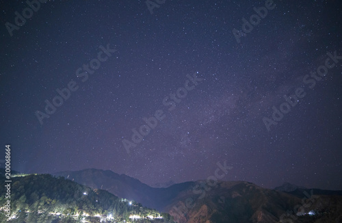 starry sky above Himalayas mountains in Dharamshala, India