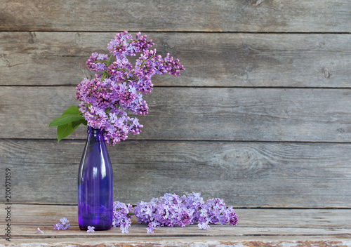 lilac on old wooden background