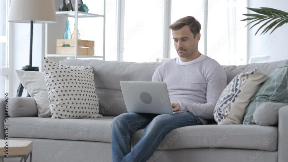 Adult Man Working On Laptop in Office Adult Man Working On Laptop in Office