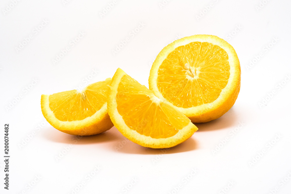 Orange slices and half on a white background Orange slices and half on a white background