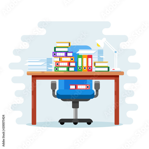 Office workplace with pile of paper documents and file folders.
