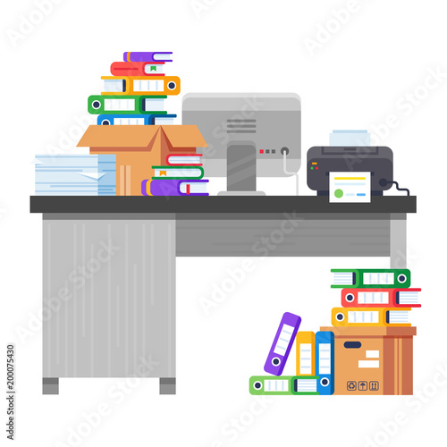Office workplace with pile of paper documents and file folders.