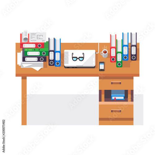 Office workplace with pile of paper documents and file folders.