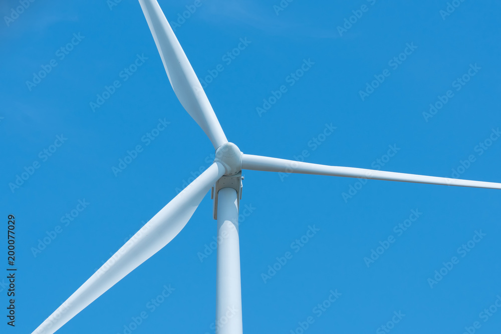 Wind turbines generating electricity with blue sky Wind turbines generating electricity with blue sky