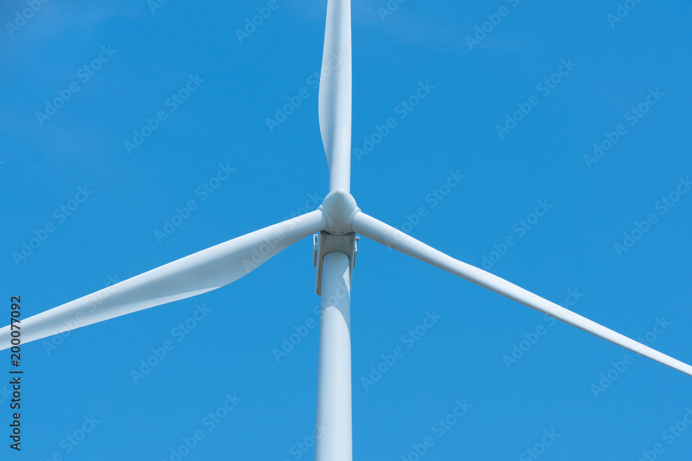 Wind turbines generating electricity with blue sky Wind turbines generating electricity with blue sky