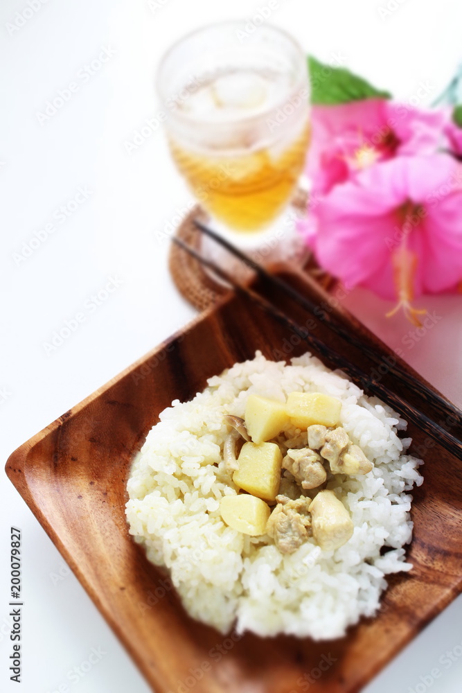 Thai food, chicken and new potato green curry on rice Thai food, chicken and new potato green curry on rice