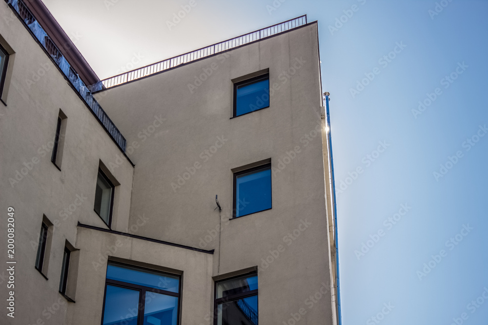 common facade on blue sky background