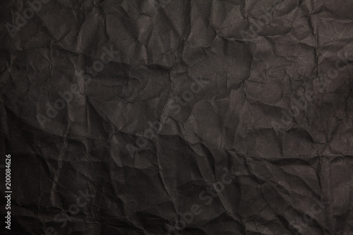 Black crumpled paper background