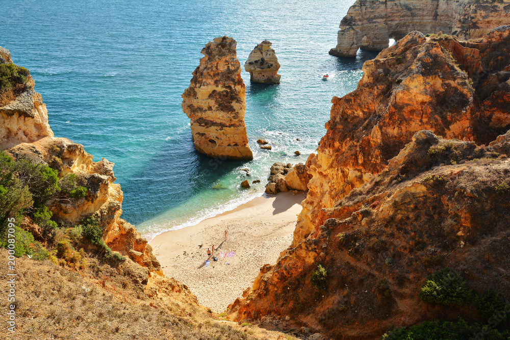 Algarve beach and rocks, amazing destination in Portugal and  all seasons attraction for many tourists in entire world