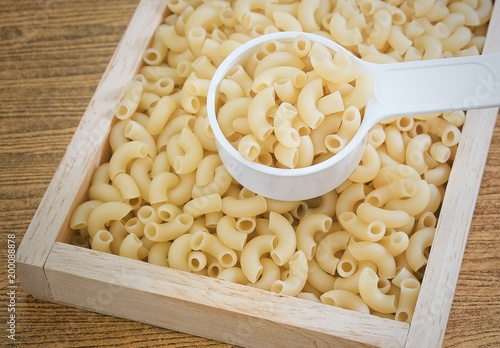 Elbow Macaroni or Gomiti Pasta in Measuring Cup