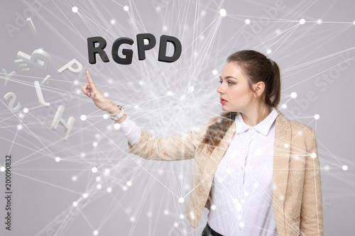 RGPD, Spanish, French and Italian version version of GDPR: Reglamento General de Proteccion de datos. General Data Protection Regulation. Young woman working with information. photo