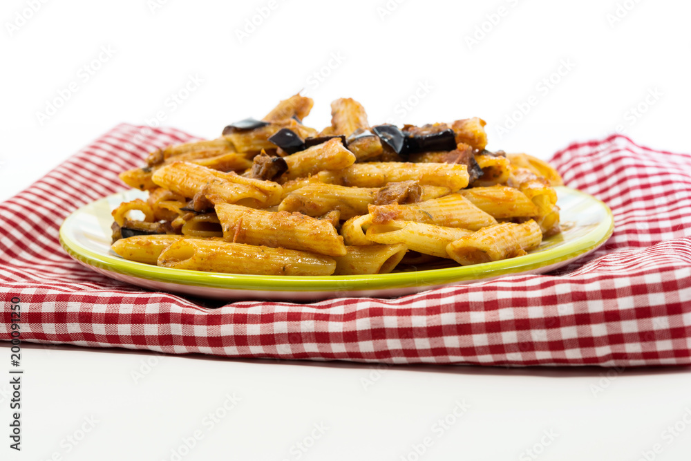 Spaghetti with aubergine and tomato sauce on a the table Spaghetti with aubergine and tomato sauce on a the table