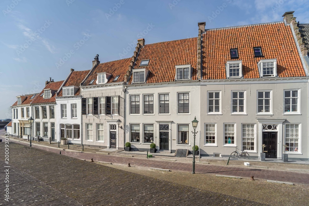 Pleasing row of medieval plastered houses in Wijk bij Duurstede near Utrecht, the Netherlands.