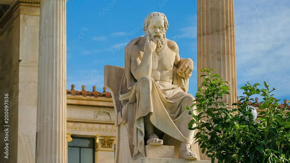 Statue of the great Greek philosopher Socrates on a marble chair