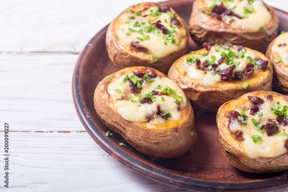 Baked potato stuffed with cheese