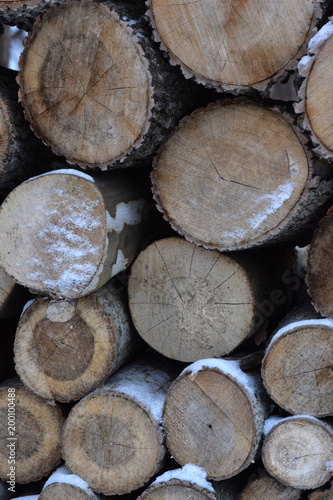 Stacked logs closeup texture background