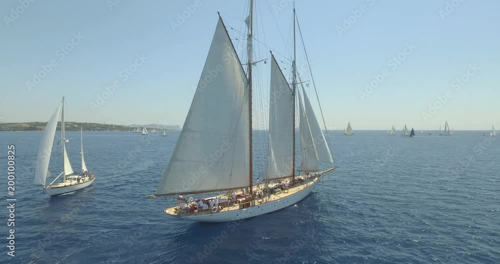 Scenic aerial of traditional yacht during a summer regatta in Spetses Scenic aerial of traditional yacht during a summer regatta in Spetses