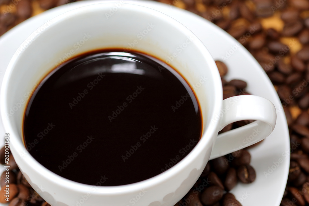 Coffee cup and coffee beans