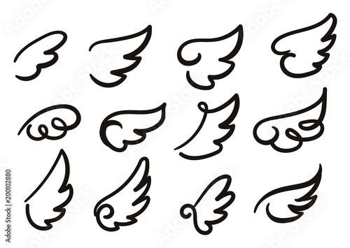 Fototapeta Naklejka Na Ścianę i Meble -  Angel wings sketch set. Hand drawn collection of wings isolated on white background. Cartoon wings vector illustration.