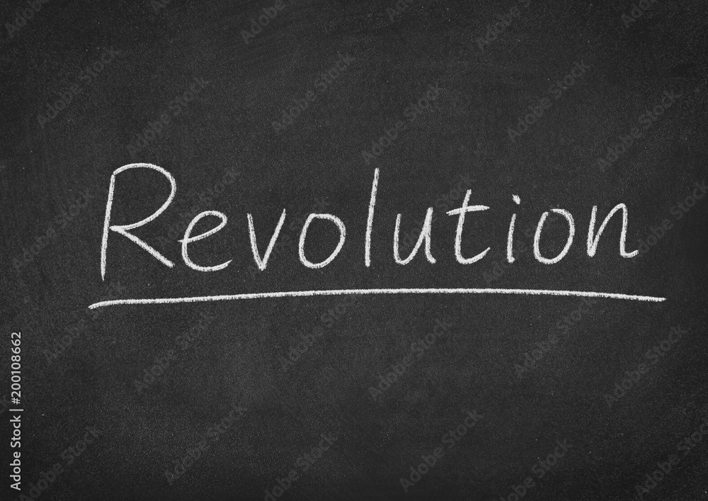 Obraz premium revolution concept word on a blackboard background