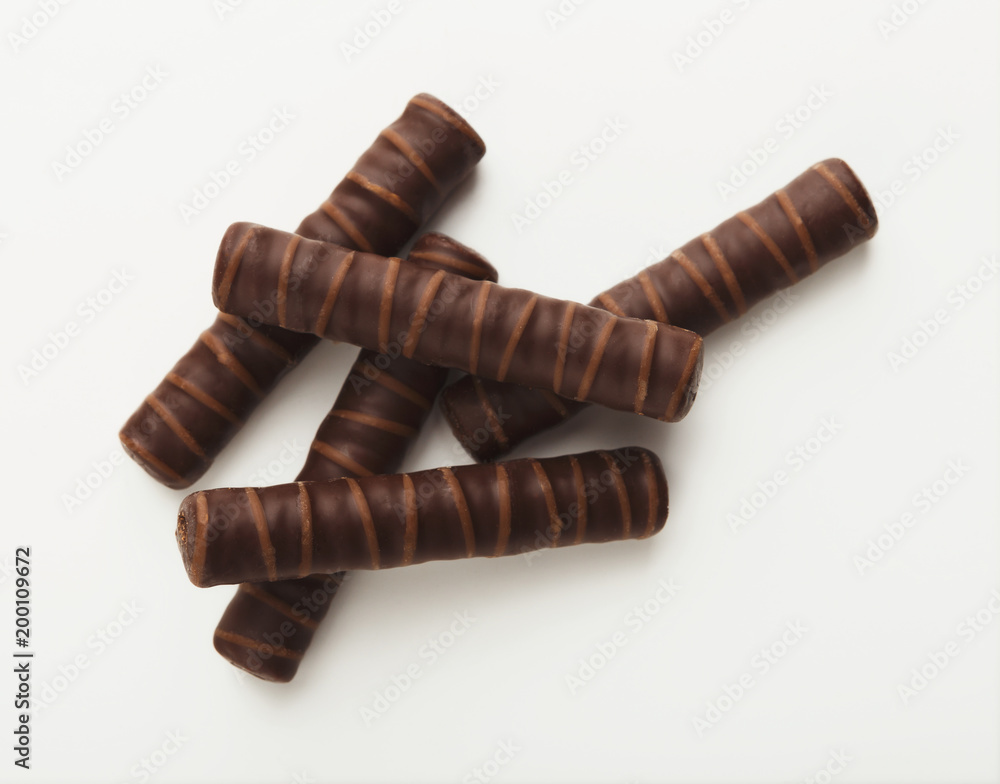 Small chocolate candies isolated on white Small chocolate candies isolated on white