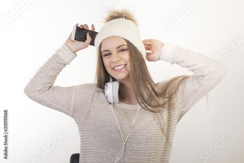 A young girl with headphones