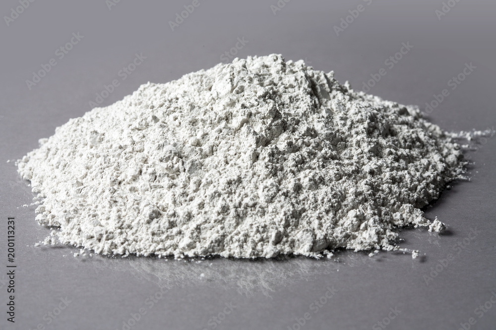 Quartz sand pile isolated grey background Quartz sand pile isolated grey background
