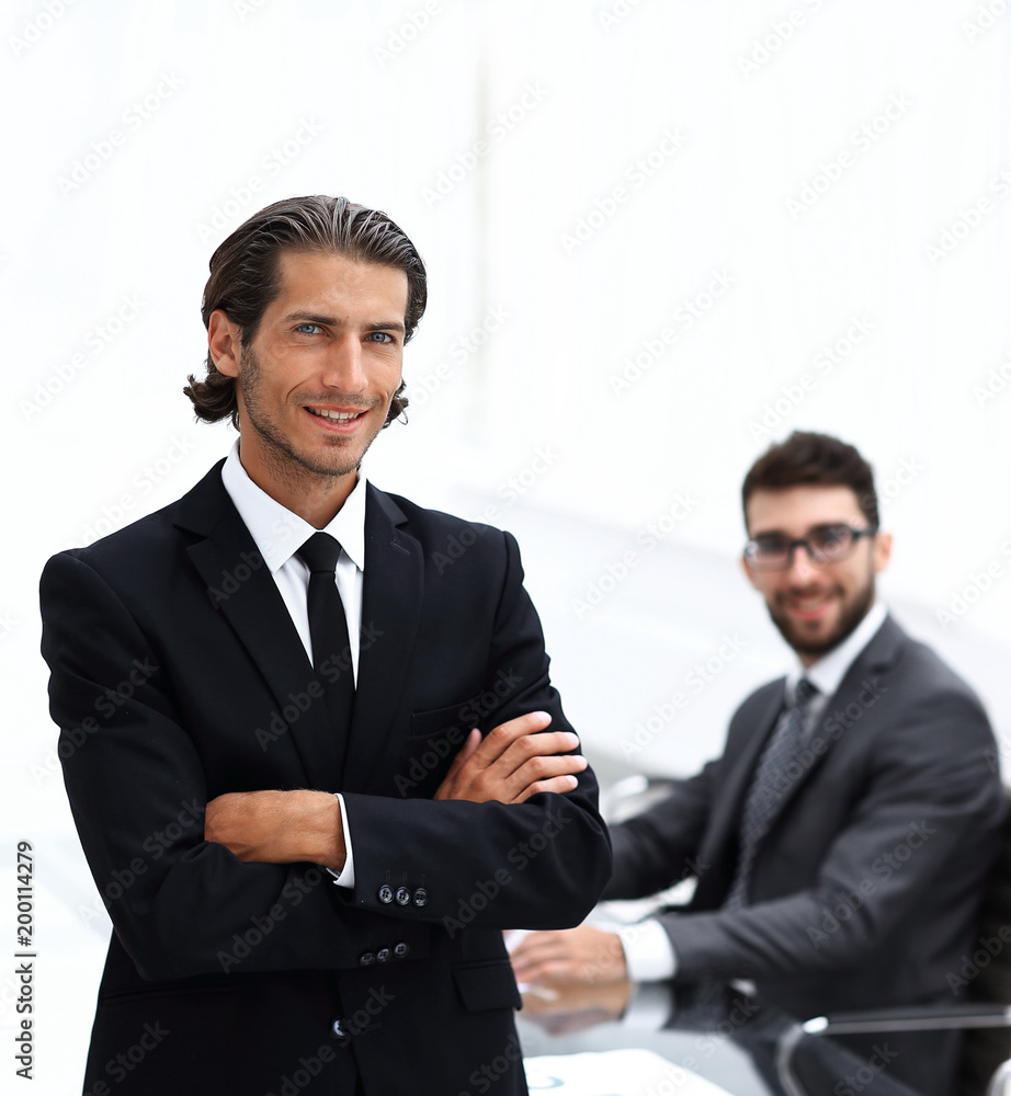 Fototapeta premium Portrait of businessman standing in office