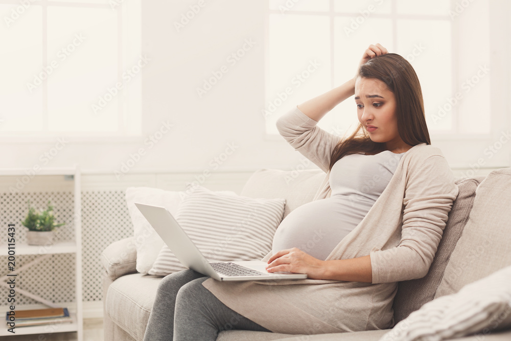 Pregnant business woman remote working at home Pregnant business woman remote working at home