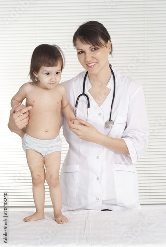Female doctor with child